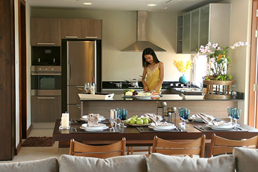 Dining and Kitchen Area with Garden and Pool View